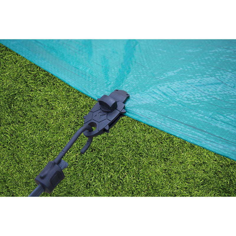Keeper Turtle Tarp Clip attached to a tarp.