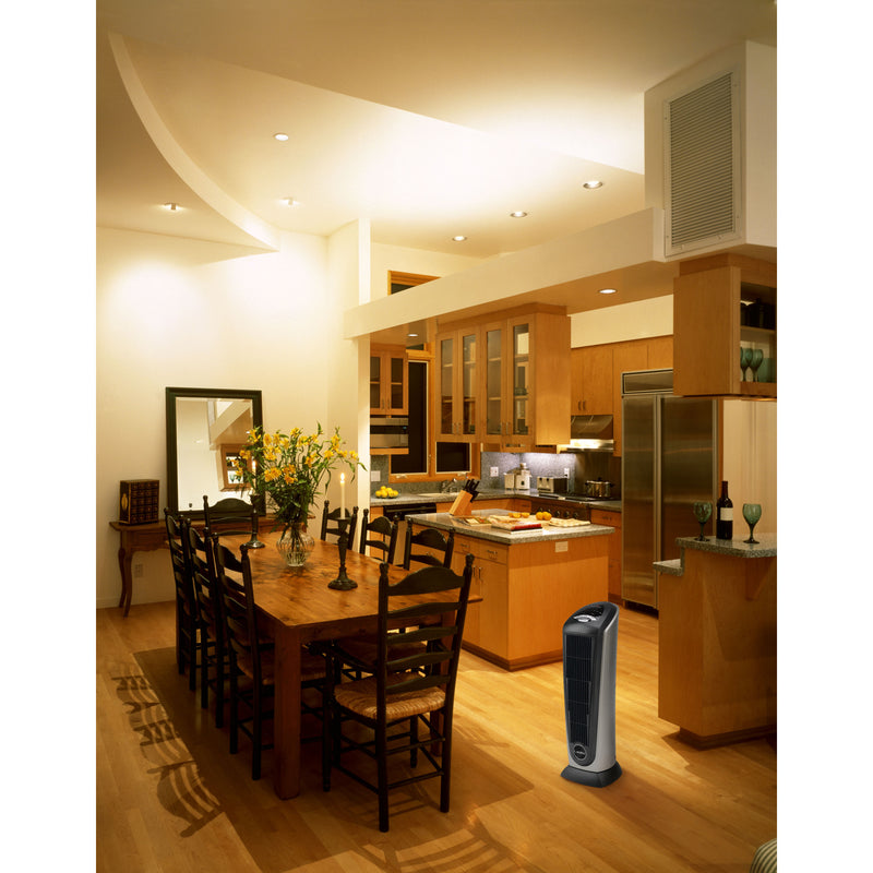 Lasko Ceramic Tower Heater with Remote Control 751320 shown in a dining room