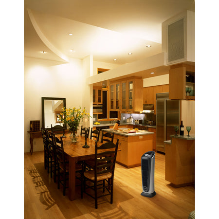 Lasko Ceramic Tower Heater with Remote Control 751320 shown in a dining room