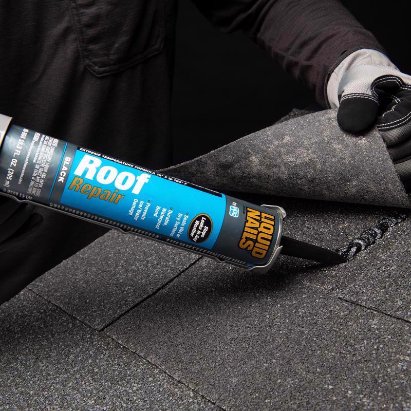 Liquid Nails Tough Repair Black Roof Repair Sealant being used to attach a roof shingle.