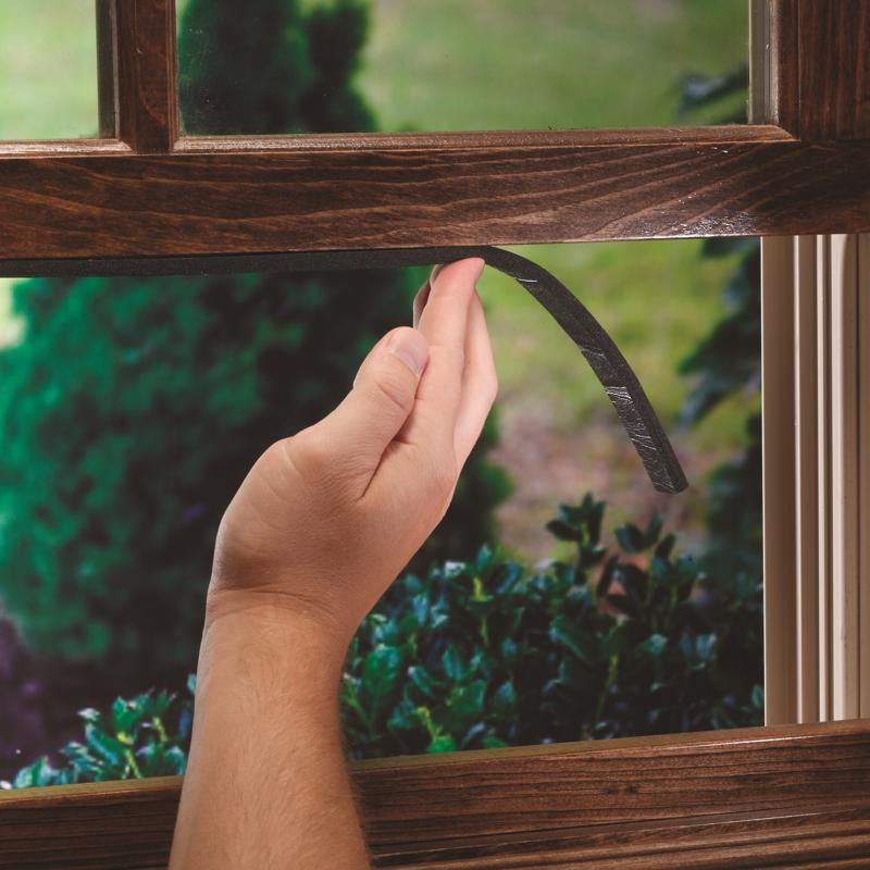 MD Building Products 06593 being applied to a window