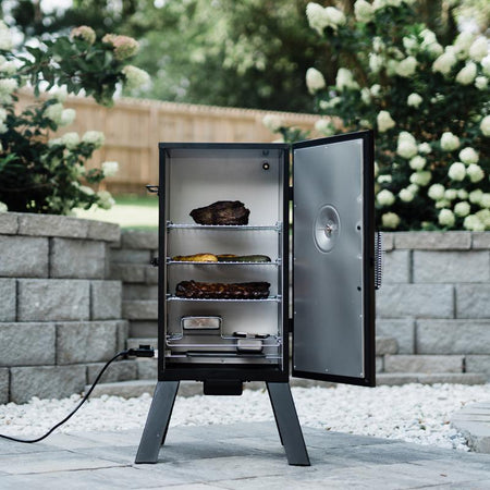 Masterbuilt Analog Wood Chips Vertical Smoker MB20070210 with door open full of food