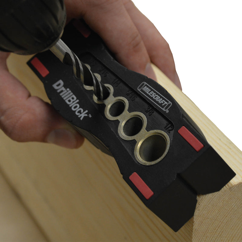 Milescraft DrillBlock Drill Guide 1312 being used on a corner of a piece of wood