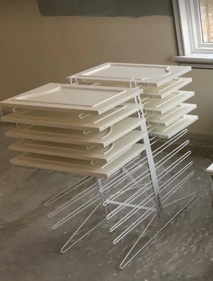 White cabinet doors on the PaintLine PDRTT Drying Rack