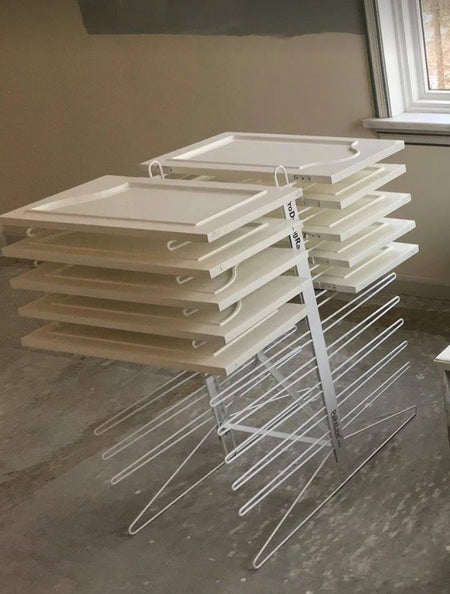 White cabinet doors on the PaintLine PDRTT Drying Rack