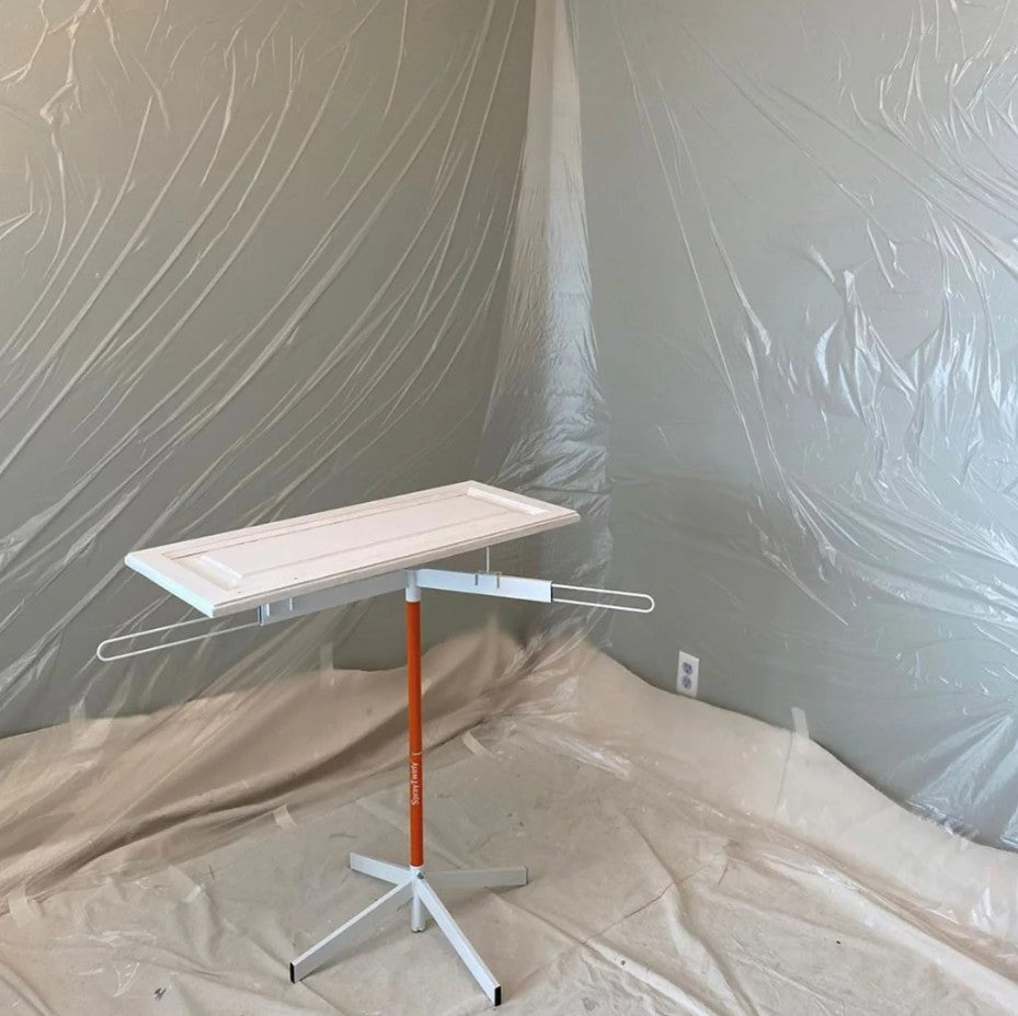 Paintline SPTY Spray Twirly Rotating Spray Table with an adjustable height on a room under renovation.