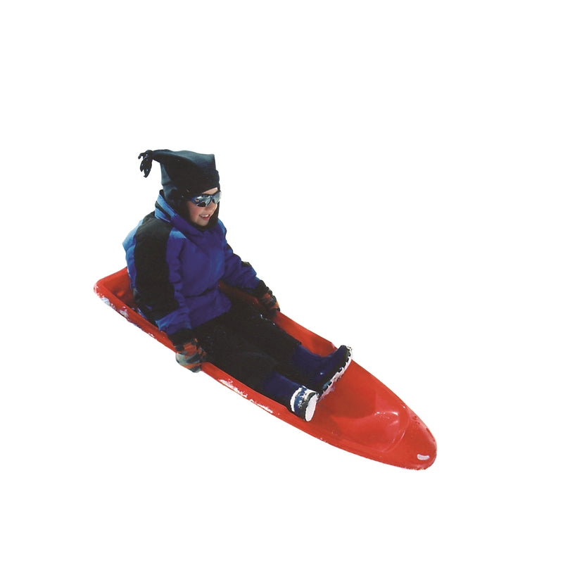 Person sitting on a red Winter Lightning Plastic Sled against a white background
