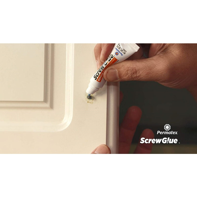 Permatex Medium Strength Screw Glue 28206 being applied to a screw on a cabinet door.