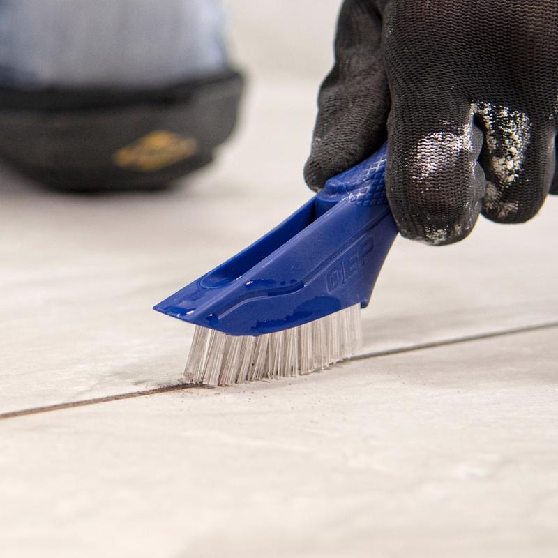 Cleaning tile grout with the QEP Grout Brush 20842