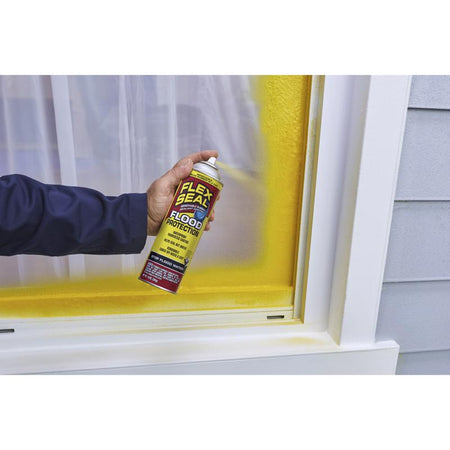FLEX SEAL Flood Protection Waterproof Rubberized Coating Spray Sealant being used around a window exterior.