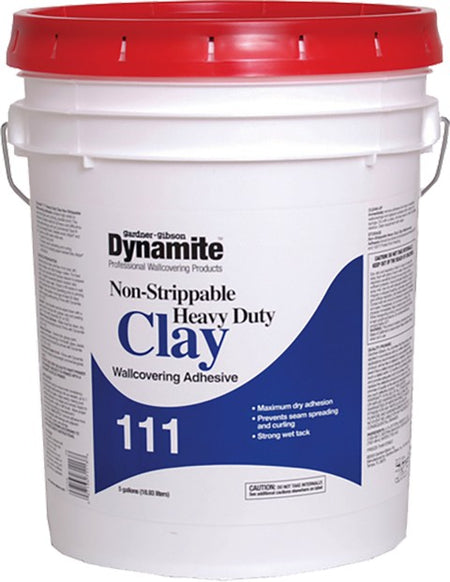 White 5 gallon bucket with red lid labeled 'Dynamite Non-Strippable Heavy Duty Clay Wallcovering Adhesive' on a white background