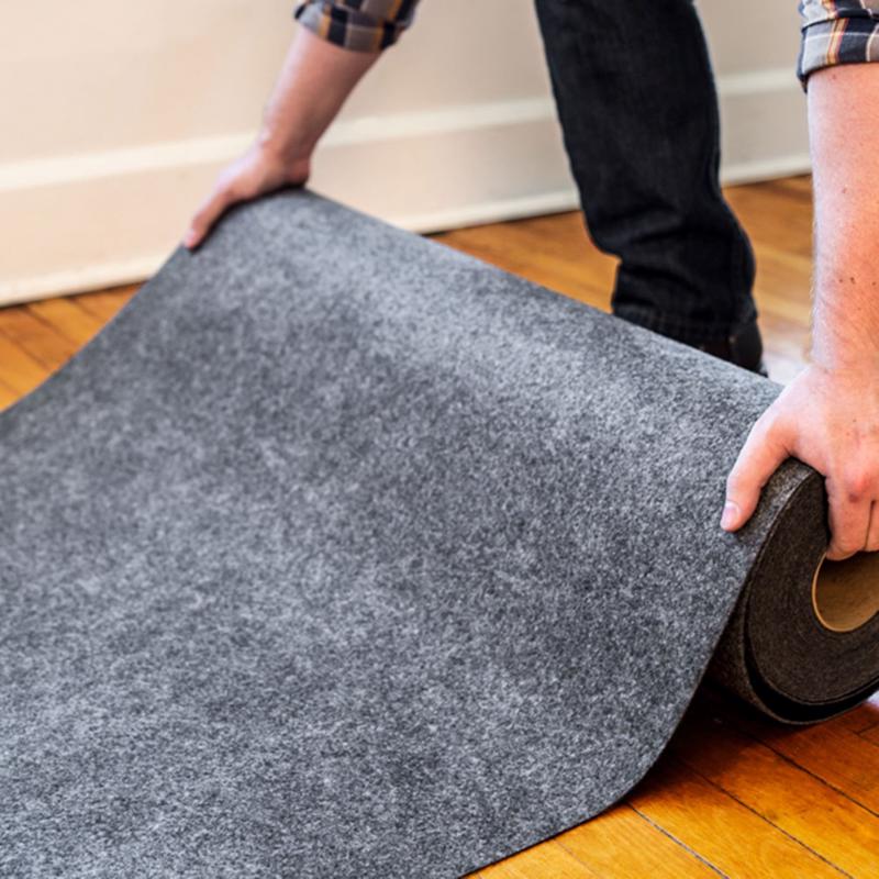 Surface Shields Pro Shield Surface Protector being rolled out on a floor.