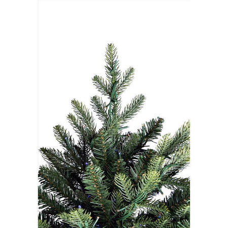 Artificial Christmas tree with green needles on a white background