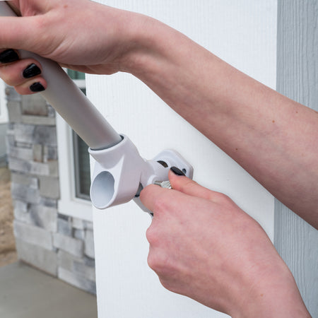 Putting a pole in the Valley Forge 10 in. L Aluminum Flag Pole Bracket 60752