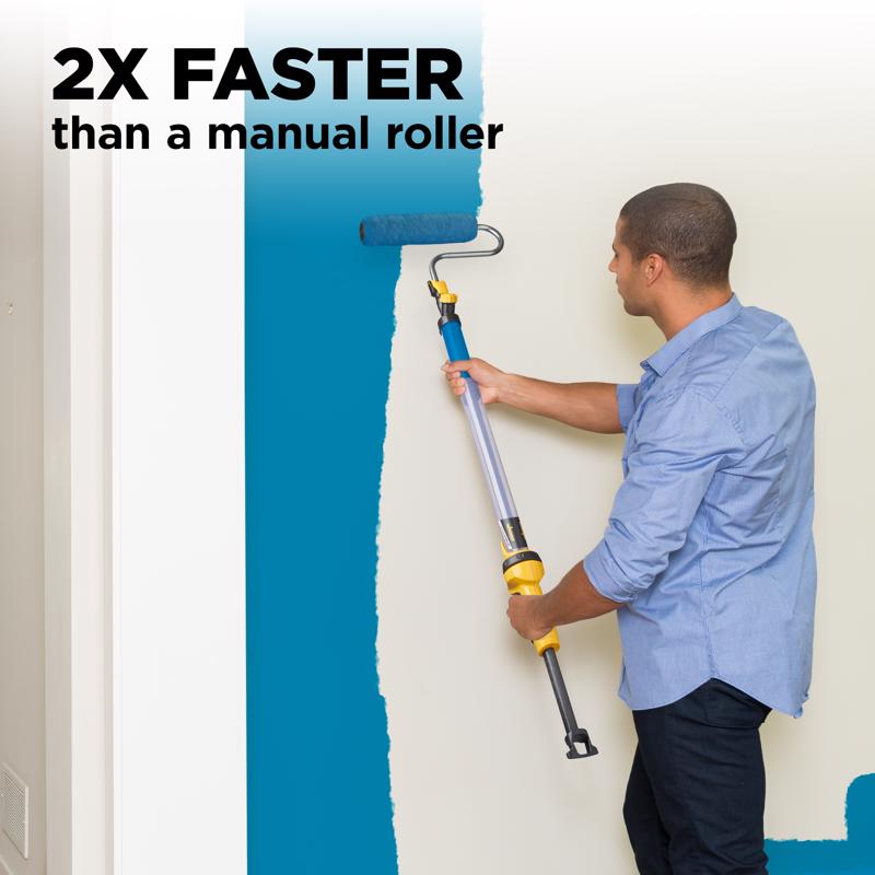 Man painting a wall with the Wagner E Z Roller 9 in. W Regular Paint Roller Kit 2419329.