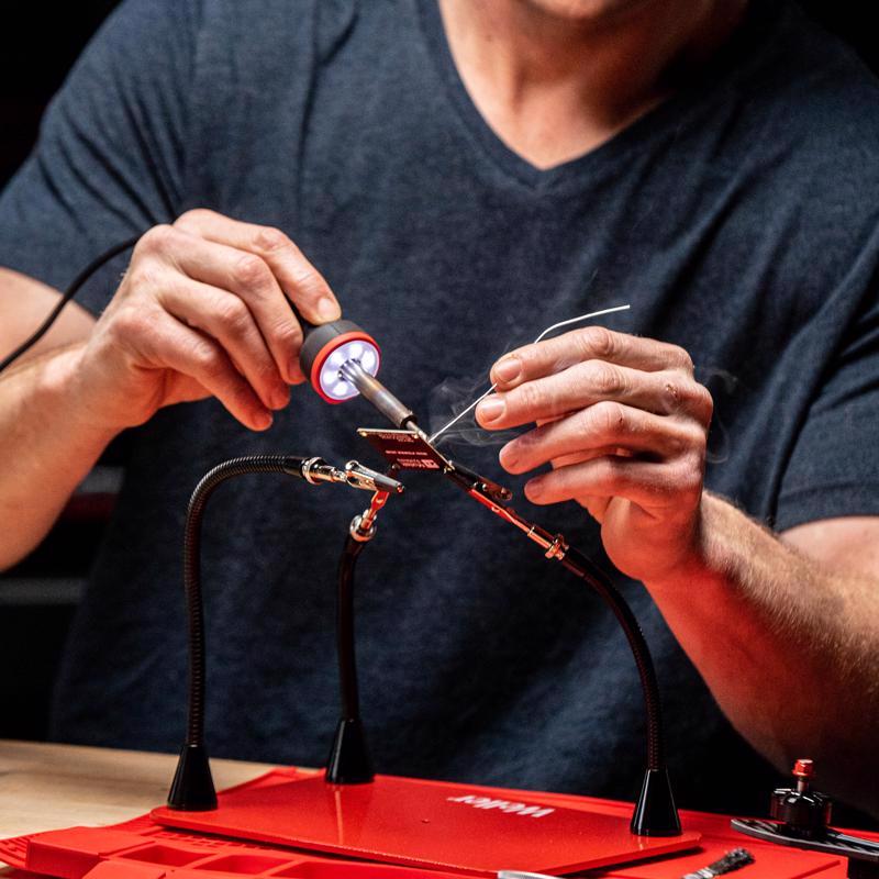 Weller Corded Soldering Iron Kit being used with a solder wire.