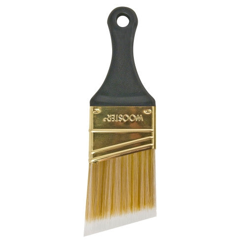 The image shows the Wooster Little Genius Paint Brush Q3222. It features a short, plastic, dark green handle made of recycled material, with a brass-plated steel ferrule holding the synthetic blend bristles.